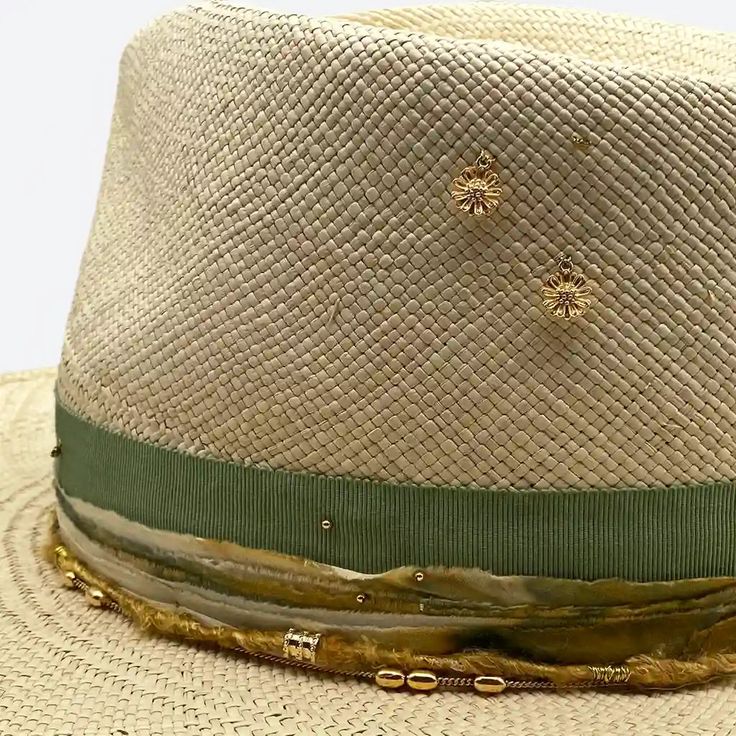 A natural and sage straw Fedora hat, what a perfect combination! Add some gold charms and silk details to the mix and you will end with the perfect hat for a perfect summer day. Hand-dyed silk and cotton ribbons Silk thread with 18k gold plated tube beads & square wire ring 24k gold plated Daisy charms 18k gold plated tiny Rose charm 24k gold plated crimp beads 18k gold filled cable chain with oval bead Tiny smoke topaz Swarovski chatons 14k gold plated flower rondelle beads 18k gold plated holl