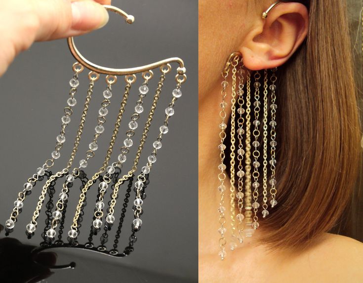 a woman is holding up two pairs of dangling earrings and the other one has an earring