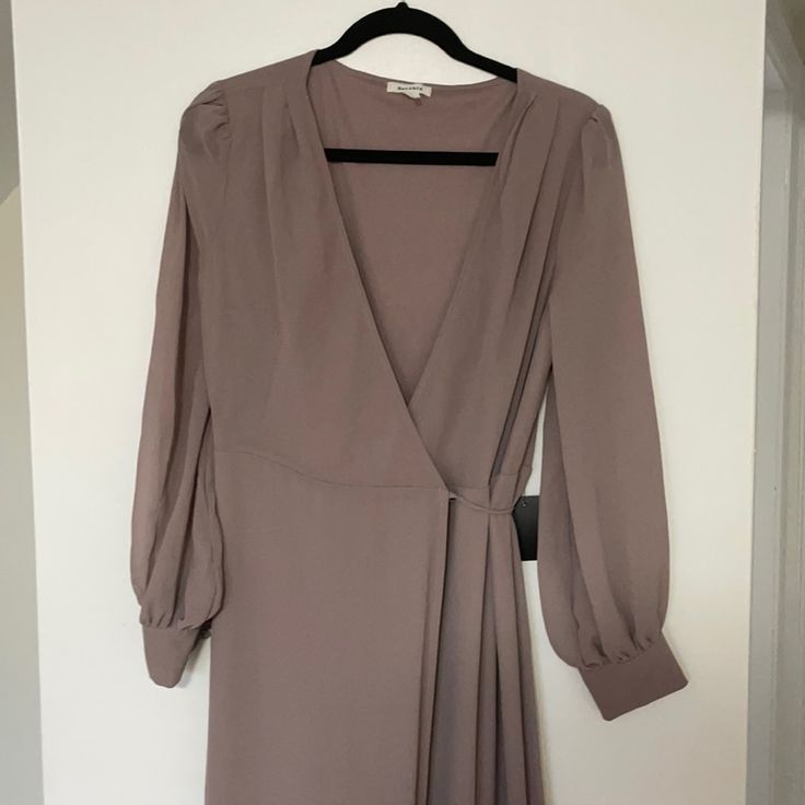 Stunning Long Sleeve Wrap Dress With Sleeve Detail Spring Evening Flowy Wrap Dress, Flowy Chic Wrap Dress For Fall, Elegant Mauve V-neck Maxi Dress, Chic Mauve V-neck Mini Dress, Fall Maxi Wrap Dress For Brunch, Chic Lavender Maxi Dress For Formal Occasions, Mauve V-neck Evening Dress, Mauve V-neck Midi Dress For Spring, Lavender Knee-length Chic Mini Dress