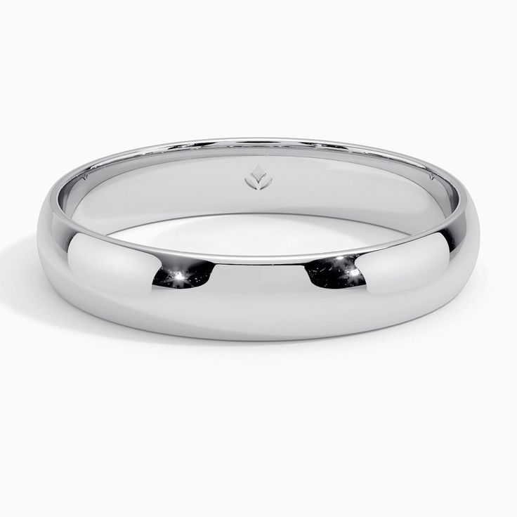 a white gold wedding ring on a white background