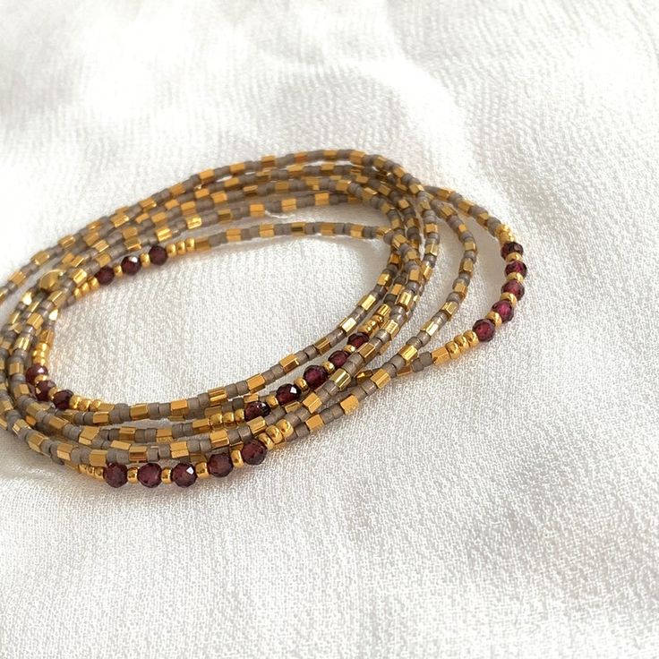 Garnet bracelet seed bead stretch wrap bracelet Birthstone | Etsy Bohemian Chic Jewelry, Jewelry Stack, Stack Bracelets, Garnet Bracelet, Seed Bead Bracelets, Chic Jewelry, Garnet Gemstone, Bohemian Chic, Boho Bracelets