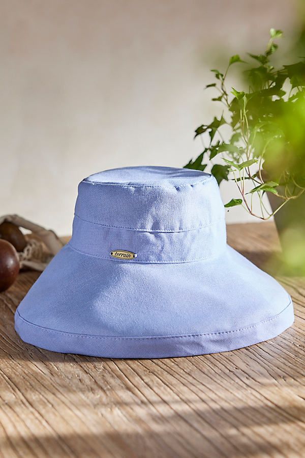 Handmade from lightweight and breathable cotton and branded with terrain exclusive details, this colorful crusher hat is perfect for a day at the beach or in the garden. Packable construction pairs with UPF 50 sun protection and an inner drawstring to assure a comfortable fit. | Cotton Crusher Hat in Purple at Terrain Adjustable Cotton Bucket Hat With Uv Protection, Adjustable Cotton Sun Hat With Uv Protection, Blue Cotton Bucket Hat For Outdoor, Adjustable Cotton Sun Hat For Summer, Cotton Bucket Hat With Short Brim For Beach, Adjustable Cotton Bucket Hat For Beach Season, Cotton Beach Bucket Hat With Short Brim, Adjustable Cotton Summer Sun Hat, Blue Wide-brim Cotton Sun Hat