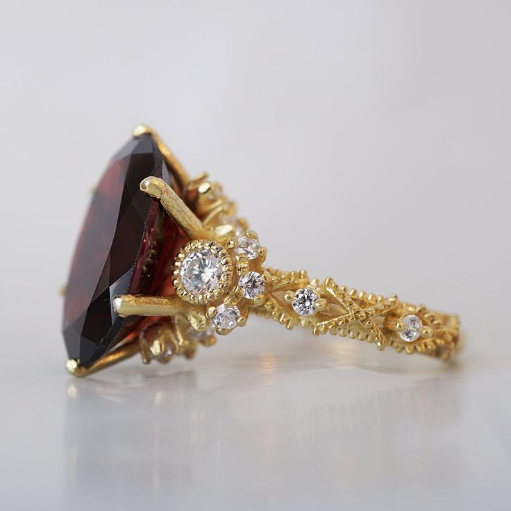 Oval Garnet Queen Victoria Diamond Ring in 14K and 18K Gold – Tippy Taste Jewelry Ruby Red Wedding Ring, Garnet Diamond Ring, Red Engagement Ring Unique, Persephone Engagement Ring, Ruby And Gold Ring, Gold Red Jewelry, Gold And Red Jewelry, Ruby Jewelry Ring, Red Engagement Ring