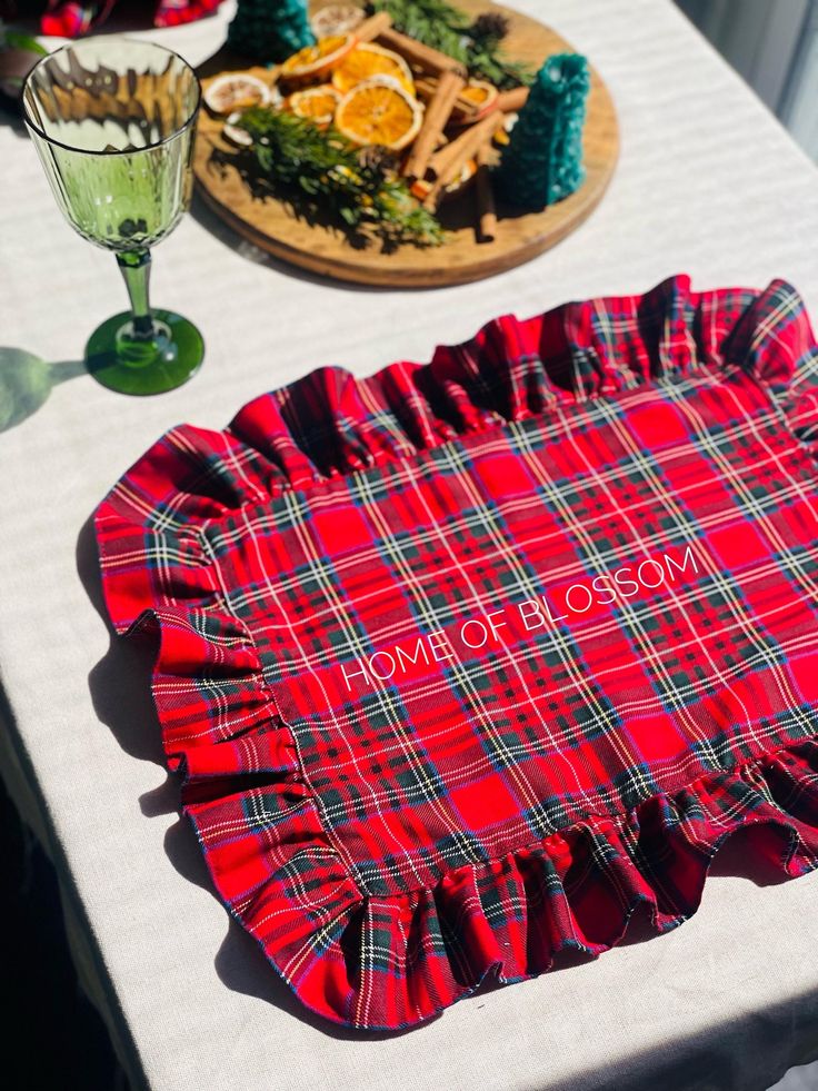 there is a tartan cloth on the table