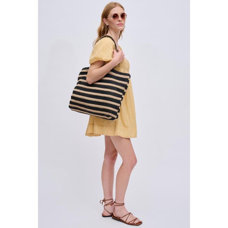 The epitome of laid-back chic, perfect for beach days or farmer's market strolls! With a breezy open closure and a woven all-over exterior featuring a stripe design, this tote effortlessly combines style with functionality. Inside, the printed fabric lining, 1 zip pocket, and 2 slip pockets make it your go-to for a fashionable and organized outing. Embrace the sunshine with a tote designed for those sunny adventures! Item Type: Tote Material: Straw Closure: Open Exterior Details: Woven All-over, Eco-friendly Rattan Tote Beach Bag, Eco-friendly Yellow Handwoven Beach Bag, Yellow Woven Eco-friendly Beach Bag, Eco-friendly Rattan Tote Shoulder Bag, Eco-friendly Woven Rattan Beach Bag, Festival Wedding, Stripes Design, Beach Day, Zip Pockets