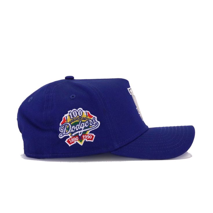 Adjustable hat. Cap is "One Size Fits Most" (OSFM). Celebrate 100 years! Hat Material: 100% CottonCrown: Dark Royal BlueVisor: Dark Royal BlueButton: Dark Royal BlueUndervisor: GreyFront Logo: Snow White/Metallic Silver/Blue InkNew Era Flag: Blue InkSide Patch: Official team colorsBartack: Dark Royal Blue Throwback Curved Brim Hats For Baseball Season, Blue Baseball Cap With Flat Brim For Fan Gear, Blue Curved Bill Fitted Hat For Baseball Season, Blue Fitted Hat With Curved Bill For Baseball Season, Blue Curved Brim Hat For Baseball Season, Blue Hats With Embroidered Logo And Curved Brim, Blue Flat Brim Baseball Cap For Fan Gear, Blue Dad Hat For Baseball Season, Blue Dad Hat With Curved Brim For Baseball Season