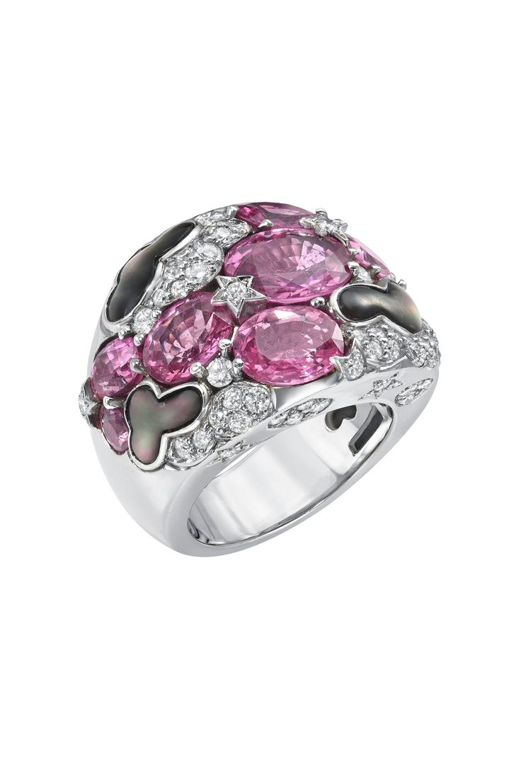 Definitely a statement ring for a jewelry aficionado! One of a kind cocktail ring by an award winning New York brand Gumuchian Fils. 18k solid white gold ring has celestial theme with the stars and clouds. Top quality 10 pink sapphires ranging in size, estimated 13 + carats total weight. 72 brilliant white diamonds, FG VS quality ranging in size from 1.2mm - 2.5mm, with 1 carat estimated weight. 4 carved abalone shell clouds. Total weight of the ring is 25,3 gr. Front part of the ring is 20 mm w Luxury Multi-stone Pink Sapphire Ring, Elegant Multi-stone Pink Sapphire Diamond Ring, Luxury Pink Sapphire Ring With Gemstone Accents, Luxury Pink Diamond Ring For Formal Occasions, Luxury Pink Multi-stone Sapphire Ring, Luxury Pink Sapphire Ring With Accent Stones, Luxury Pink Oval Sapphire Ring, Elegant Multi-stone Diamond Ring With Pink Sapphire, Luxury Pink Sapphire Silver Ring