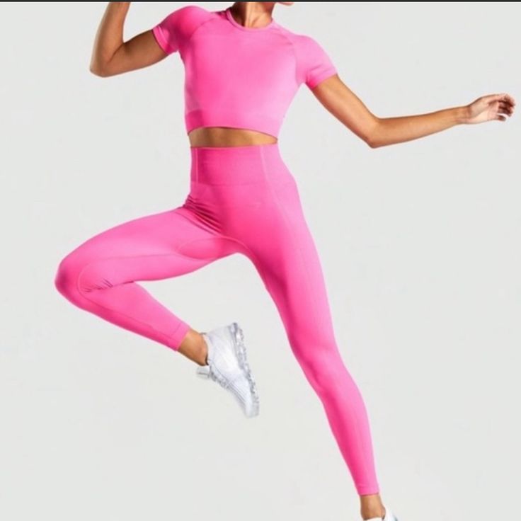 Gymshark Ultra Seamless Leggings - Cyber Pink. Never Worn! Pink Short Sleeve Activewear For Training, Pink Seamless Stretch Leggings, Pink Stretch Gym Set, Pink Stretch Gym Sets, Pink Stretch Athleisure Sets, Pink Athleisure Sets For Gym, Pink Stretch Short Sleeve Sets, Pink Fitted Workout Set, Pink Fitted Sports Sets