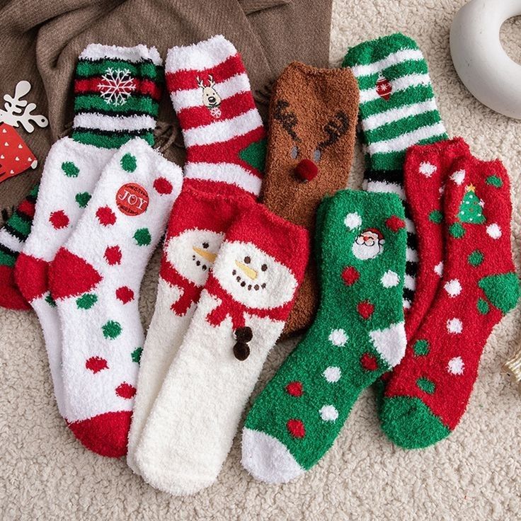 several christmas socks are laid out on the floor