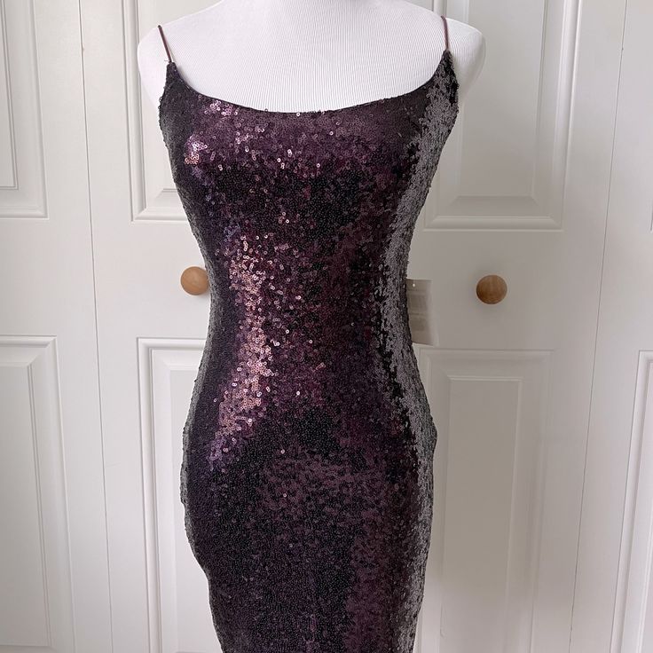 This Is A Dark Purple Sequin Semi Formal Dress. Size 3/4, New With Tags Sleeveless Sequin Dress For Dress-up, Purple Fitted Homecoming Dress, Fitted Purple Homecoming Dress, Purple Fitted Dress For Homecoming, Purple Sleeveless Sequin Dress For Prom, Purple Sleeveless Sequin Homecoming Dress, Purple Sequined Mini Dress For Formal Occasions, Purple Dresses For Dress-up Party Season, Purple Dress For Dress-up Party Season