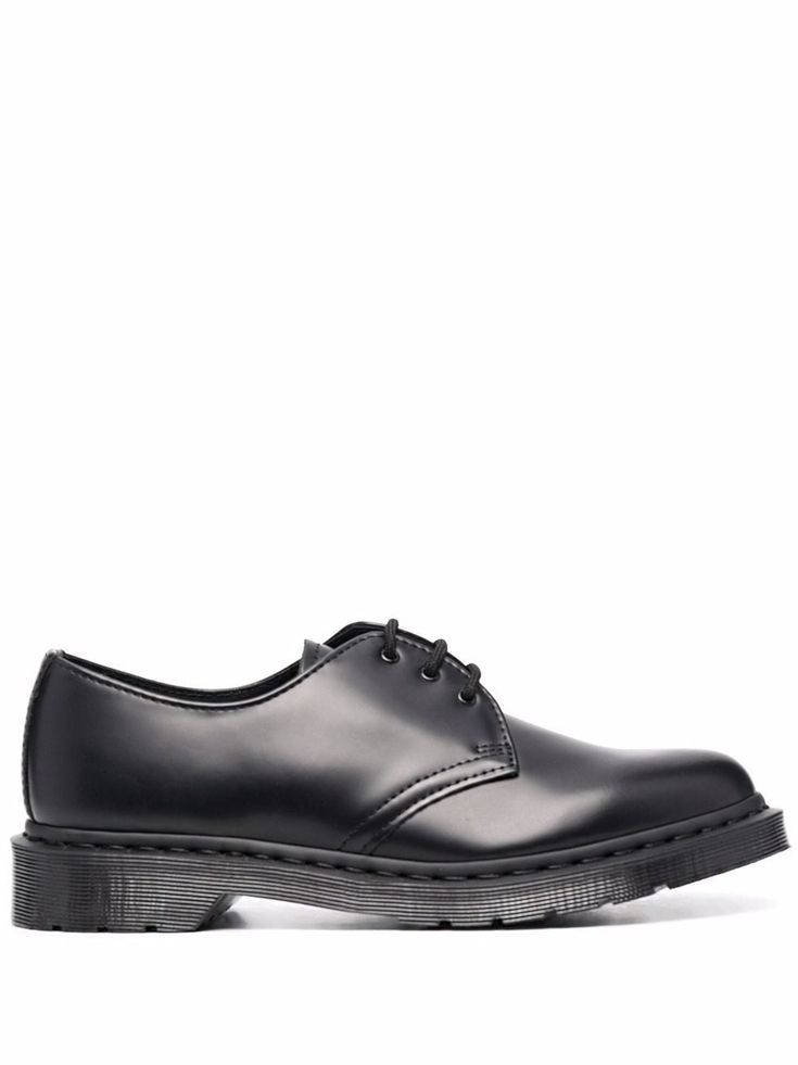 Black leather 1461 Mono 3-Eye lace-up shoes from DR. MARTENS featuring tonal stitching, eyelet detailing, almond toe, front lace-up fastening, low block heel and ridged rubber sole. Classic Low-top Dress Shoes With Leather Footbed, Classic Closed Toe Formal Sneakers, Classic Oxfords With Vibram Sole, Classic Black Sneakers With Leather Footbed, Classic Sneakers With Leather Footbed For Work, Classic Oxfords With Vibram Sole And Round Toe, Classic Leather Shoes With Vibram Sole, 3rd Eye, Low Block Heels