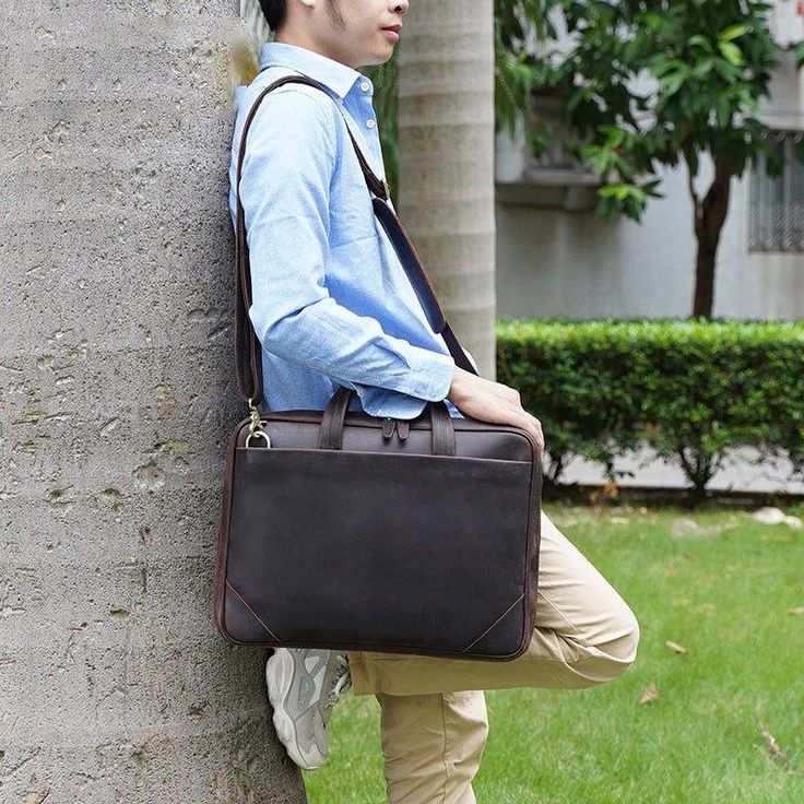 This leather computer bag for men protect your gadgets.To ensure your computer is safe,our men’s leather bag includes a thick protection pocket in the laptop compartment.Business bag for men should include protection for all your gadgets,and our bag offers the best protection.    ITEM FEATURES   - 1 x Front Zipper Compartment (3 x Slot Pockets) - 1 x Main Compartment - 1 x Laptop Compartment - 1 x Back Zipper Compartment - 1 x Back Buckle Compartment - Multiple Slot Pockets - Genuine Leather & Durable - Detachable Shoulder Strap - Fit 15.6" Laptop     🎁🎁🎁The bag will be sent by registered, priority mail with a Woosir free gift.    ITEM DETAILS   *Item Type: Briefcase *Material: Crazy Horse Leather *Size: L41 *W5 *H30(CM) *Color: Dark Brown *Closure Type: Zipper *Style: Vintage    CAR Portable Leather Business Bags, Portable Leather Shoulder Bag For Business, Portable Leather Shoulder Bag For Office, Portable Brown Business Satchel, Brown Business Laptop Bag With Large Capacity, Brown Large Capacity Laptop Bag For Business, Classic Portable Leather Bags, Business Laptop Bag With Shoulder Strap, Portable Leather Satchel For Everyday Use