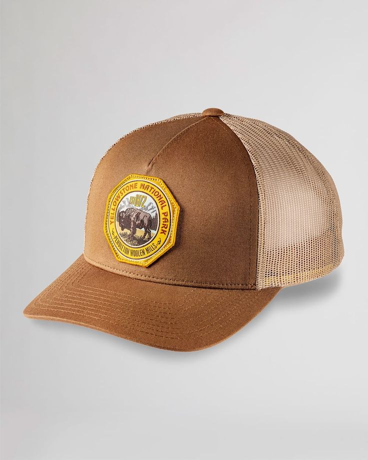 Experience the beauty our beloved national parks with our five-panel cap featuring a unique and iconic national park emblem. Breathable mesh panels and an adjustable snap back make this hat a comfortable and stylish choice for any outdoor adventure! National Park Trucker Hats: Material: Polyester & cotton. One size fits all. Care: Spot clean. Pendleton is proud to support the National Park Foundation, the official charity of America's national parks. More than $1.3 million has been contributed so far thanks to customers like you. Check out our Facebook Photos for fun and inspirational ideas on decorating any space! Don't forget to follow and like our page while you're there. Trucker Baseball Cap For Outdoor Activities, Trucker Baseball Cap With Flat Bill For Outdoor Activities, Trucker Baseball Cap With Flat Bill For Outdoor, Brown Trucker Hat For Camping, Outdoor Trucker Baseball Cap With Curved Brim, Trucker Baseball Cap With Curved Brim For Outdoor, Outdoor Trucker Cap With Curved Brim, Brown Trucker Hat With Logo Patch For Outdoor, Outdoor Flat Brim Hat With Logo Patch