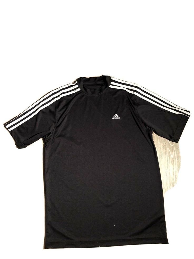 Adidas mens black eith ehite stripes athletic shirt size Medium. Condition is "Pre-owned". Shipped with USPS First Class. Sporty Black T-shirt With Contrast Stripes, Adidas Contrast Stripes Crew Neck T-shirt, Adidas Crew Neck T-shirt With Contrast Stripes, Adidas Crew Neck T-shirt With Side Stripes, Short Sleeve Activewear With Three Stripes For Workout, Sportswear T-shirt With Three Stripes For Workout, Adidas Three Stripes Workout T-shirt, Adidas Three Stripes Tops For Gym, Adidas Striped Tops With Three Stripes