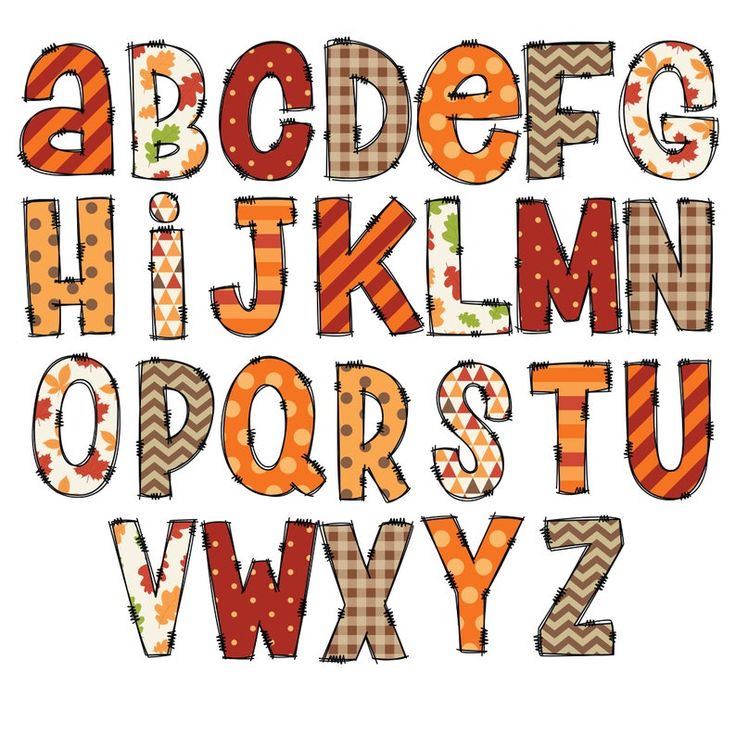 the letters are made out of fabric and have different patterns on them, including an orange stripe