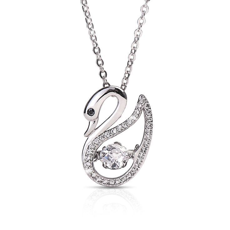 Swans represent grace and beauty. Here we bring to you an elegant swan; delicately crafted by jewelry artisans from sterling silver, cradled by smaller flawless Diamondeau® - the Supreme Diamond Alternatives for added subtle sparkle. An elegant midnight black Diamondeau® - the Supreme Diamond Alternative sits at its eye as its head is nestled in a modest pose. This pendant features a revolutionary design where the center Diamondeau® - the Supreme Diamond Alternative is suspended and allowed to v Elegant Jewelry With Sparkling Stones For Anniversary, Silver Glamorous Jewelry For Gift, Glamorous Silver Jewelry For Gifts, Elegant Cubic Zirconia Jewelry Gift For Her, Glamorous Sterling Silver Jewelry With Diamond Cut, Elegant Crystal Jewelry Gift, Elegant Sparkling Stones Jewelry Gift, Elegant Crystal Jewelry For Gifts, Exquisite Sparkling White Gold Jewelry