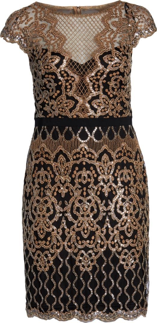 a dress with gold and black sequins on it