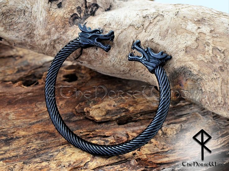 "Viking Bracelet Nidhogg Dragon Head Torc, Black Stainless Steel Viking Arm Ring, Celtic Dragon Torque Cuff, Norse Mythology, Viking Jewelry This solid Nidhogg Dragon Bracelet is made from high quality hypoallergenic stainless steel with black plating, suitable for both men and women. It is adjustable and will fit wrist from approx. 16cm up to 20cm (6.3\" - 7.9\")  ➤ Fits to wrist from approx. 16cm up to 20cm (6.3\" - 7.9\")  ➤ Bracelet Length (head to head): approx. 22 cm (8.7\")  ➤ Diameter: approx. 7.5 x 6.5cm (adjustable) ➤ Inner diameter: about 6 x 5 cm (adjustable) ➤ Thickness : about 6mm ➤ Weight : approx. 30-35g.  High quality stainless steel has high resistance to rust, corrosion and tarnishing, which requires minimal maintenance. Stainless steel is one of the most bio-compatible Adjustable Medieval Style Bangle Jewelry, Black Oxidized Finish Bracelet Jewelry, Adjustable Black Oxidized Bracelet, Black Viking Metal Jewelry, Black Gothic Bracelet, Handmade Viking Style Black Bracelet, Medieval Style Bracelet Jewelry Gift, Adjustable Black Viking Bracelet, Viking Style Metal Bracelet Jewelry