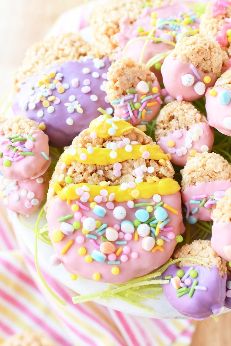 there are many donuts that have sprinkles on them in the plate