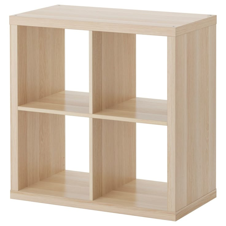 a wooden shelf with four sections on each side