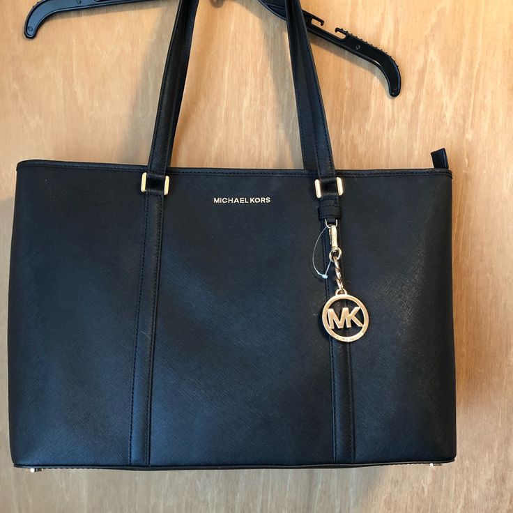 Black Large Michael Kors Tote Bag. Perfect For Carrying A Laptop. Michael Kors Business Tote Shoulder Bag, Michael Kors Business Bag With Double Handle, Michael Kors Double Handle Bags For Business, Michael Kors Double Handle Business Bags, Michael Kors Tote Bags For Business, Michael Kors Top Handle Business Bags, Black Travel Bags With Branded Hardware, Michael Kors Black Shoulder Bag For Business, Michael Kors Black Business Shoulder Bag