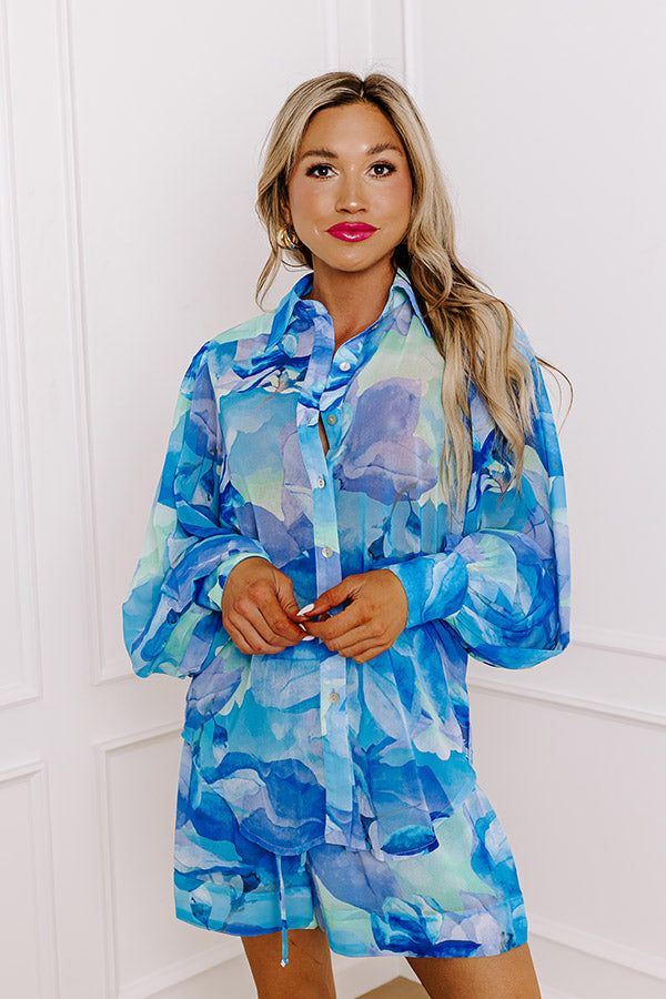 - Say hello to summer style with this gorgeous sheer button-up! This lightweight top is perfect for those sunny, carefree days, adding a pop of color to your wardrobe. With its playful patterns and refreshing hues, it is ideal for pairing with your favorite shorts or trendy pants. Whether you are heading to a picnic, a brunch, or a casual day out, this top will keep you looking stylish and feeling cool. Embrace the season in style with this must-have summer essential! - Unlined sheer chiffon mat Pink Games, Short One Piece, Trendy Pants, Abstract Floral Print, Summer Essential, Chiffon Material, Black Dresses Casual, A Picnic, Lightweight Tops