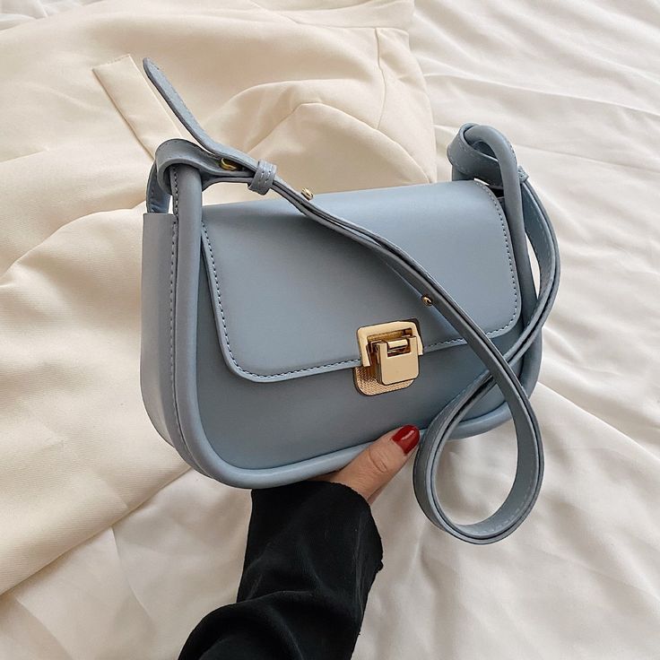 SPECIFICATIONSTypes of bags: Shoulder HandbagsStyle: FashionShape: FLAPPlace Of Origin: HE BEI ProvincePlace Of Origin: HE BEI  ProvincePattern Type: SolidOrigin: CN(Origin)Occasion: VersatileNumber of Handles/Straps: SingleModel Number: BT3672Main Material: PULining Material: PolyesterHardness: HARDHandbags Type: Shoulder BagsGender: WOMENClosure Type: COVERBrand Name: vodiu SIZE: (Width)21cm * (Height)14cm * (Thickness)8cm NOTE: 1. In different scenes, there may be minor color difference. 2. T Luxury Blue Casual Shoulder Bag, Blue Handheld Shoulder Bag For On-the-go, Blue Shoulder Bag With Pockets For On-the-go, Women Fashion Design, Bags For Women Fashion, Blue Shoulder Bag With Leather Handles For On-the-go, Woman Shoulder, On-the-go Blue Shoulder Bag With Leather Handles, Mk Purse