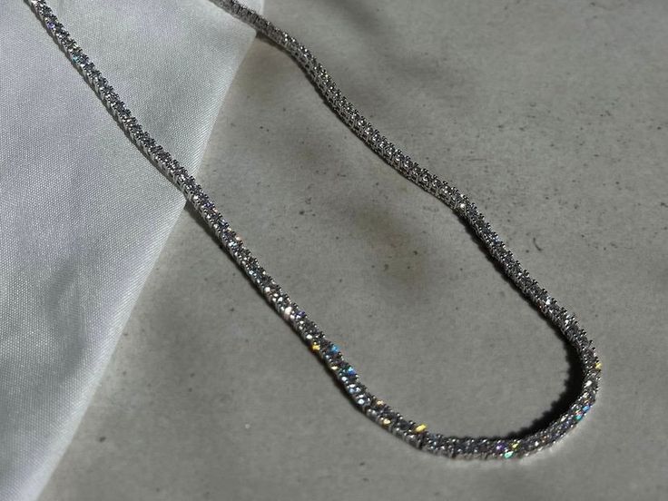 "Welcome to my store! I invite you to enjoy our massive holiday gift sale!! Up to 20% off + free worldwide shipping!! This gorgeous Dainty Rhinestone Choker Necklace is the perfect piece of jewelry to add a touch of elegant style.  It can also be perfect as a dainty bridal necklace or great holiday gift ideas for someone you love! ♦ Material ♦ - The choker necklace is made of 100% 925 sterling silver with rhodium plated. - Cubic Zirconia stones inlaid. ♦ Sizes ♦ Necklace length: 13.8\" (35 cm) + 2.4\" (6cm) Necklace width:  0.1\" (0.2 cm)  NOTES ♦ Each jewelry item is expertly handcrafted with great care and completed as swiftly as possible, typically within 1-5 business days. ♦ Each product is elegantly packaged in a designed gift box, ready to be presented to your loved one.  A blank car Silver Tennis Necklace With Rhinestones, Crystal Tennis Necklace With Sparkling Stones For Gift, Gift Crystal Tennis Necklace With Sparkling Stones, Silver Tennis Necklace With Clavicle Chain For Wedding, Silver Tennis Necklace With Rhinestones For Wedding, Silver Rhinestone Tennis Necklace For Wedding, Silver Rhinestone Tennis Necklace For Anniversary, White Gold Clavicle Chain Tennis Necklace Gift, White Gold Tennis Necklace Clavicle Chain Gift