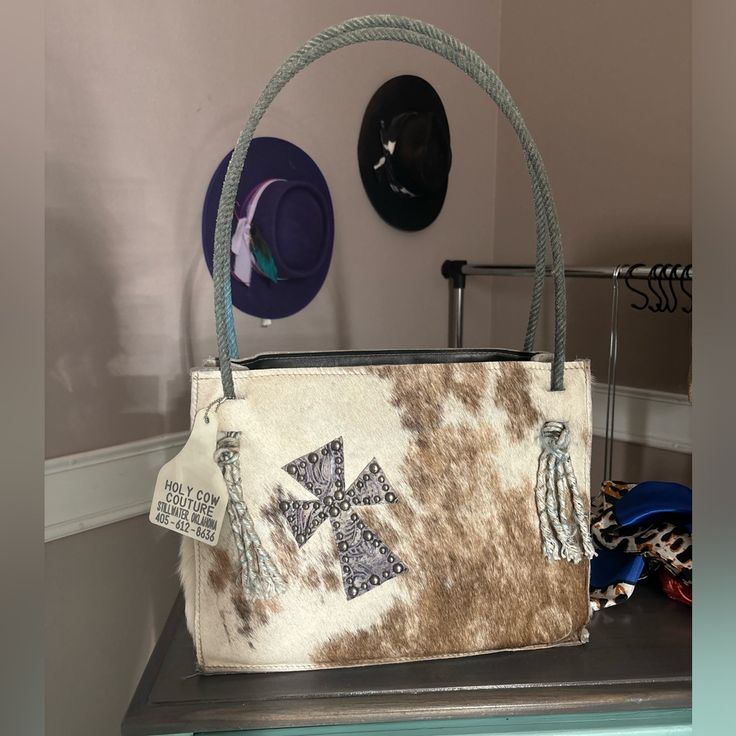 Hcc Authentic Cowhide Purse Includes Original Ear Tag Great Condition Wrangler Purse, Stillwater Oklahoma, Cowhide Purse, Ear Tag, Holy Cow, Rope Handles, Still Water, Womens Tote Bags, Cow