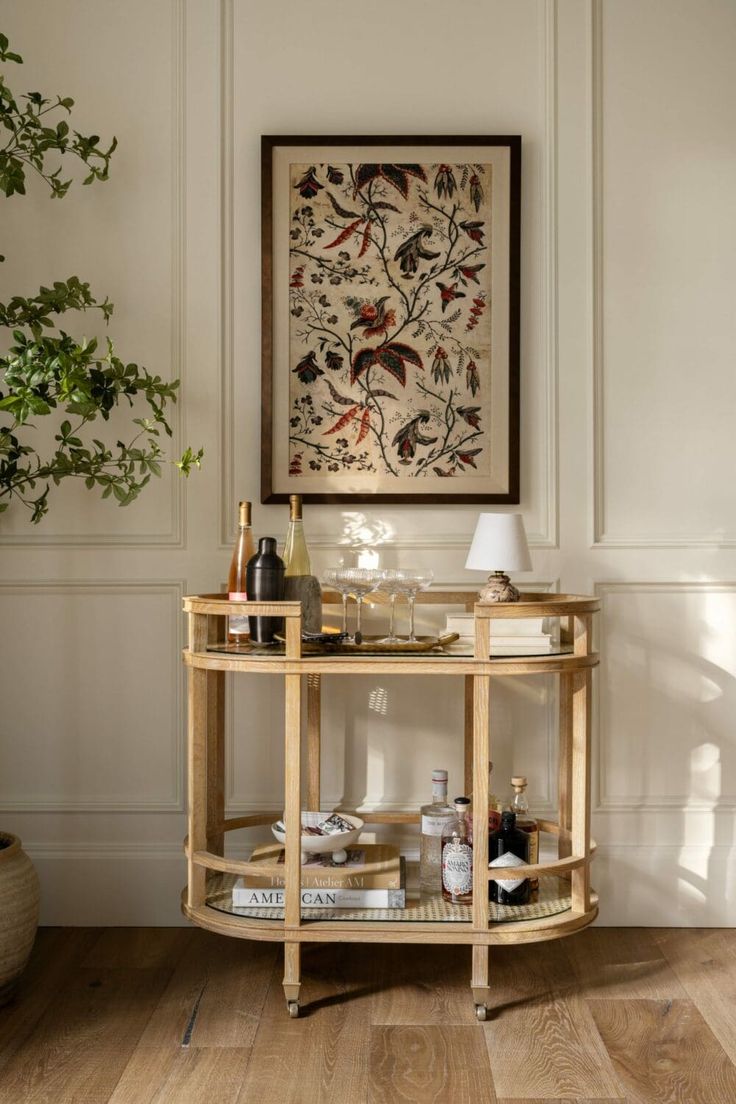 a wooden table topped with lots of bottles