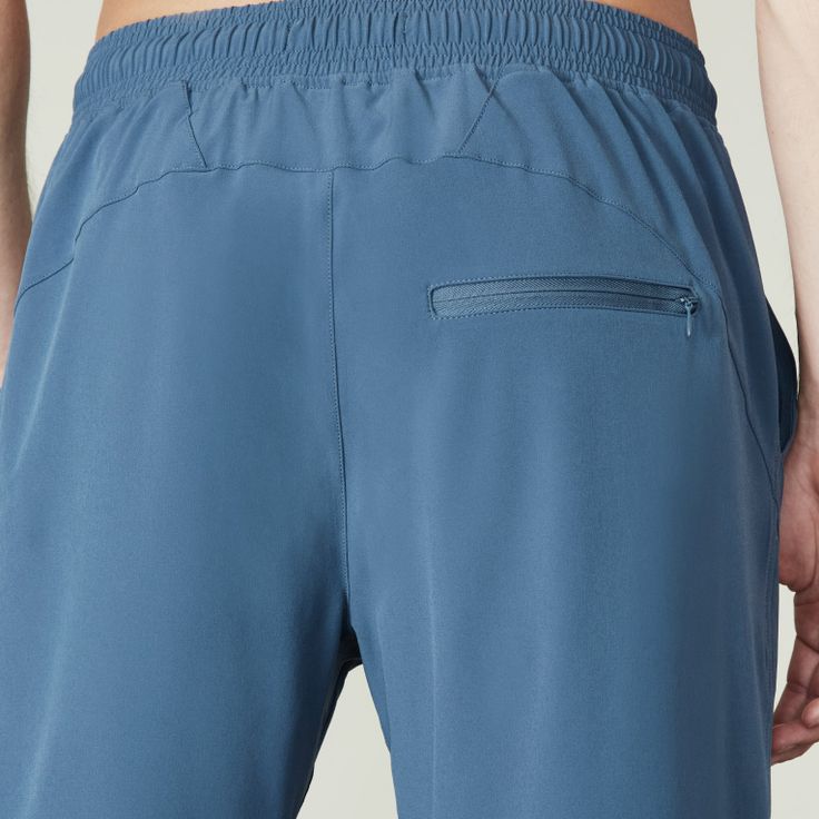 The Stride Athletic Short is a lightweight, premium-quality essential that doesn’t overcomplicate things. Its breathable, quick-dry material, comfortable adjustable waistband, spacious pockets, and streamlined silhouette will make you wonder how you ever worked out with a pair. Functional Gym Bottoms With Elastic Waistband, 4-way Stretch Go-dry Bottoms For Gym, 4-way Stretch Gym Bottoms, Go-dry 4-way Stretch Gym Bottoms, Sports Activewear With Elastic Waistband And 4-way Stretch, 4-way Stretch Activewear With Elastic Waistband For Gym, Compressive Athletic Shorts With Elastic Waistband For Sports, Breathable Recycled Polyester Athletic Shorts For Workout, Breathable Functional Sports Bottoms