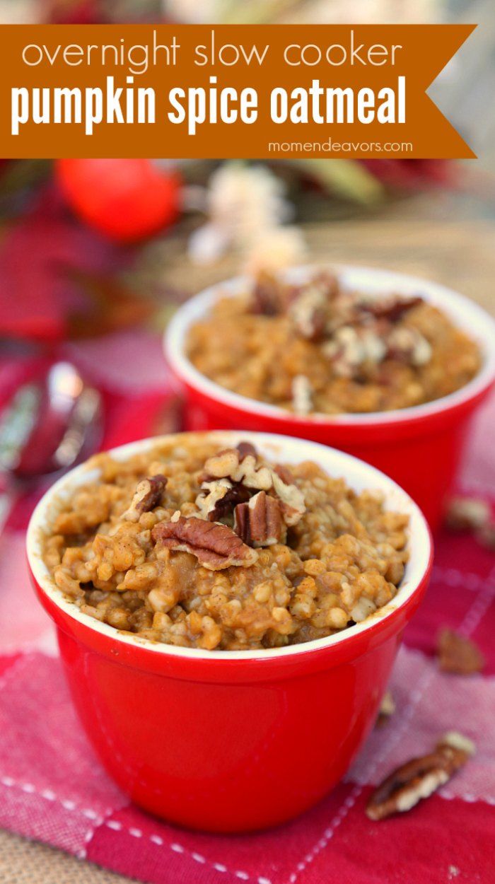 two red bowls filled with pumpkin spice oatmeal on top of a table