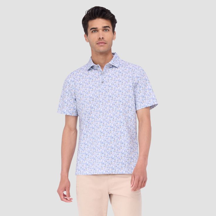 The Victor abstract print OoohCotton short-sleeved polo shirt featuring a three-button placket, mother-of-pearl buttons, and a self-fabric collar is the ideal choice for looking and feeling your best, whether you are enjoying a casual day or performing on the golf course. OoohCotton is a performance, double-mercerized, wrinkle-resistant, breathable, and easy-care cotton blend with 8-way stretch, quick-dry, and thermal comfort properties. Summer Collared Polo Shirt With Button Closure, Summer Polo Shirt With Spread Collar, Summer Polo Shirt With Spread Collar And Placket, White Button Closure Polo Shirt For Summer, White Collared Polo Shirt For Summer, Collared Polo Shirt For Summer, Collared Polo Shirt With Placket For Summer, Modern Polo Shirt With Collared Neckline For Summer, Summer Cotton Polo Shirt With Spread Collar