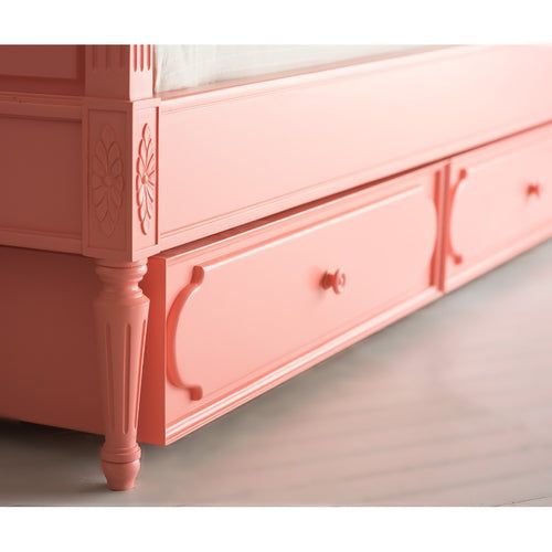 an image of a pink bed with drawers on the bottom and side rails that are painted in different colors