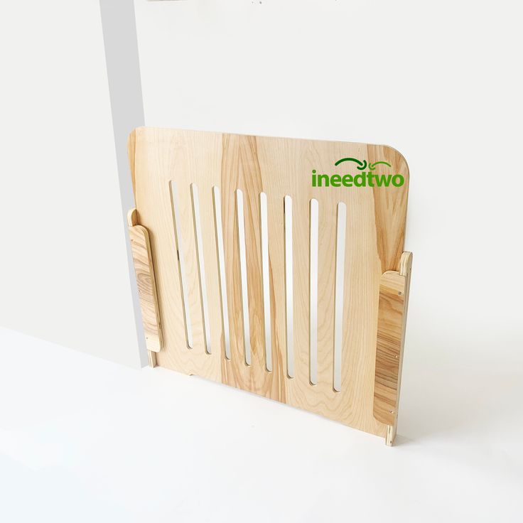 a wooden rack with the word ineed two on it's front and back sides