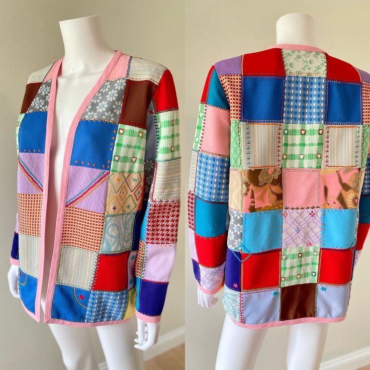 two mannequins are dressed in colorful patchwork clothing and one is wearing a pink cardigan