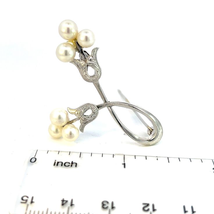 Mikimoto Estate Akoya Pearl Brooch Pin 5.60 mm 4.6 Grams M351This elegant Authentic Mikimoto Estate sterling silver brooch has 6 Saltwater Akoya Cultured Pearls ranging in size from 5.60 mm with a weight of 4.6 Grams.TRUSTED SELLER SINCE 2002PLEASE SEE OUR HUNDREDS OF POSITIVE FEEDBACKS FROM OUR CLIENTS!!FREE SHIPPINGDETAILS6 Fine Quality Japanese Akoya PearlSize: 5.60 mmWeight: 4.6 Grams “Discover the pinnacle of classic elegance with this authentic Mikimoto brooch, featuring the finest Japanes White Gold Brooch For Anniversary In Fine Jewelry Style, White Gold Brooch Fine Jewelry For Anniversary, White Gold Brooches For Anniversary In Fine Jewelry Style, Wedding Brooches In White Gold And Sterling Silver, White Gold Sterling Silver Brooches For Wedding, White Gold Brooches For Anniversary Fine Jewelry, White Gold Sterling Silver Wedding Brooches, Fine Jewelry White Gold Round Brooches, Classic White Gold Brooch For Formal Occasions