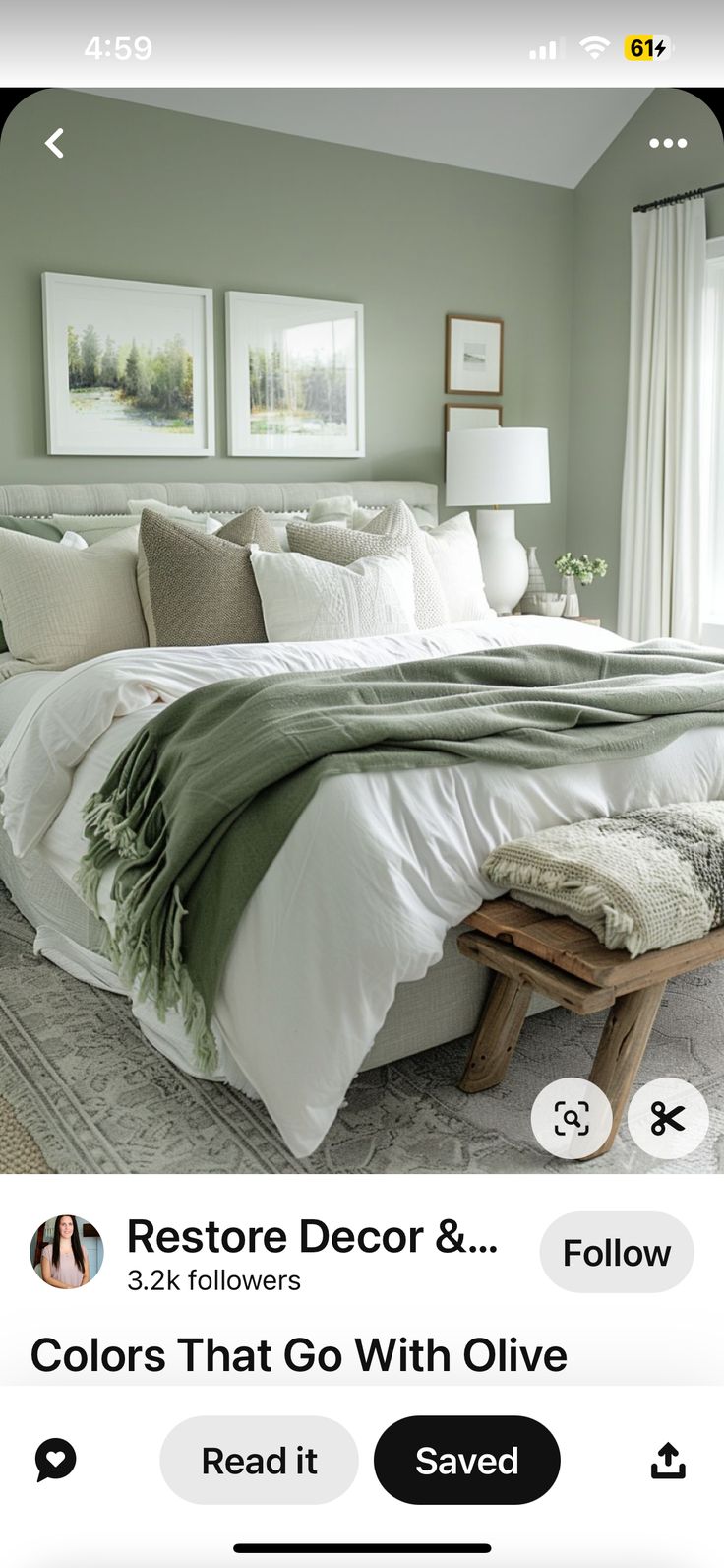 an image of a bedroom with green walls and white linens on the bedspread