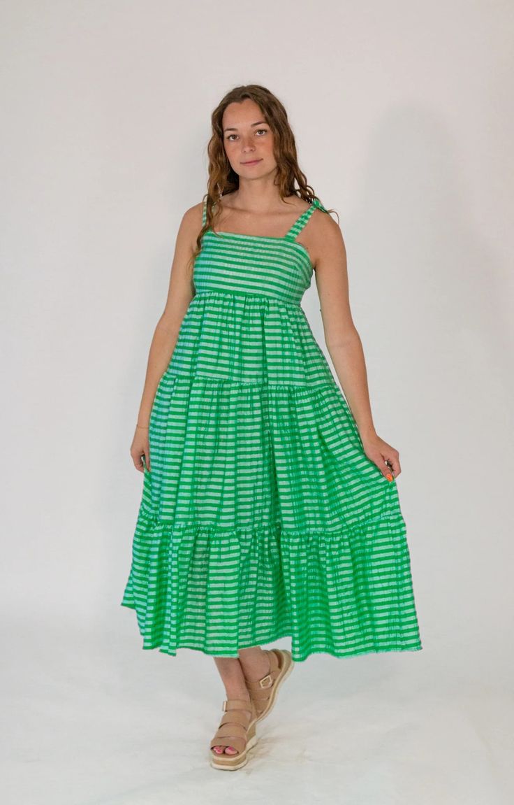 Archie Gingham Dress – Twirl Boutique Gingham Sundress For Spring, Gingham Fitted Dress For Vacation, Fitted Gingham Dress For Vacation, Casual Green Cotton Maxi Dress, Summer Gingham Tiered Dress, Summer Tiered Gingham Dress, Tiered Gingham Dresses For Summer, Casual Gingham Tiered Dress, Tiered Cotton Dress For Day Out