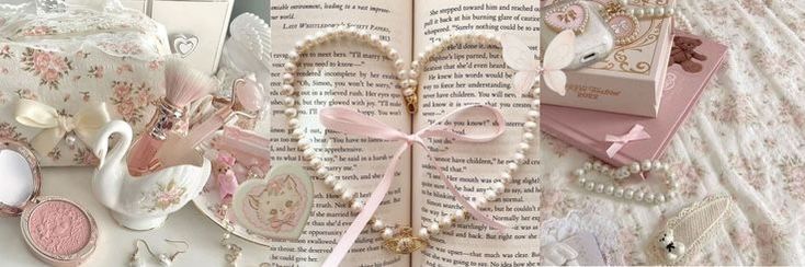 an open book with pink and white decorations on it next to other items that include jewelry