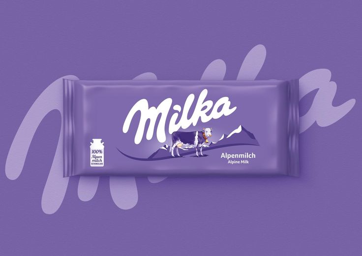 a bar of milk chocolate with the word milk on it's wrapper against a purple background