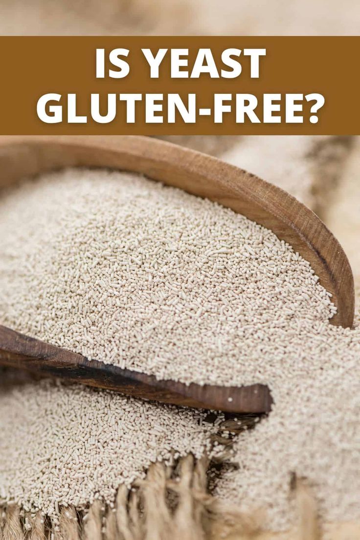 a wooden spoon with white grains in it and the words is yeast gluten - free?