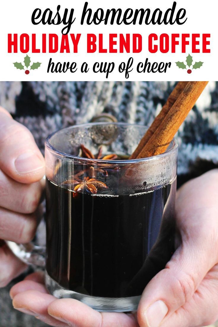 someone holding a cup of coffee with cinnamon sticks in it and text overlay that reads, easy homemade holiday blend coffee have a cup of cheer