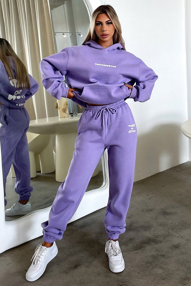 Obsessing over the Series 3 sets! She offers a soft fleece inside, an elasticated waistband, a front pocket and a puffed up 'THATSSOFETCH' logo at the front and back. Pair her with the matching Sweatpants and white runners for an off duty look this winter. Purple And White Sweatpants, Sportswear Tracksuit With Pockets For Jogging, Tracksuit With Pockets For Jogging, Hooded Tracksuit With Pockets For Jogging, Trendy Winter Joggers With Drawstring, Streetwear Fleece Joggers With Drawstring, Athleisure Tracksuit With Drawstring For Streetwear, Long Sleeve Tracksuit With Pockets For Jogging, Relaxed Fit Letter Print Sweatpants For Winter