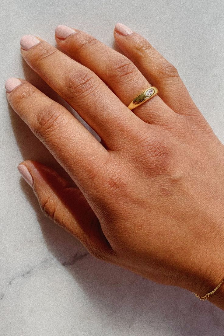 Our Dome Ring is a modern take on a timeless classic with a refined feminine silhouette. Inspired by Scandinavian simplicity, this ring will make a unique addition to your style and fit seamlessly into your everyday. Everyday Jewelry Gold, Dome Ring, Yellow Gold Jewelry, Feminine Silhouette, Domed Ring, 14k Gold Ring, Everyday Jewelry, Signet Ring, Timeless Classic