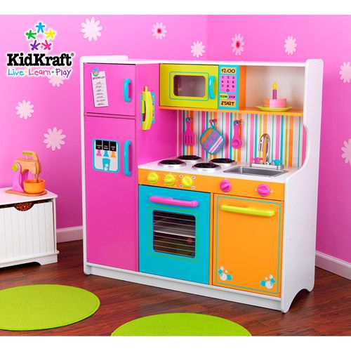 a kidkraft kitchen playset with multicolored cabinets and stove top oven