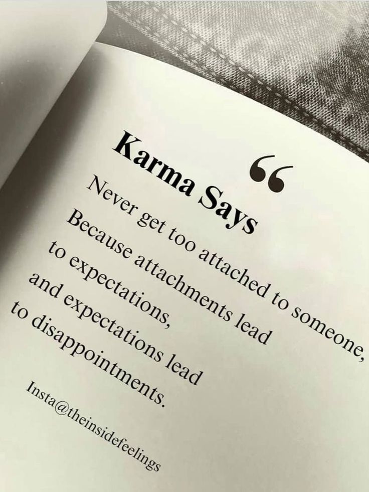 an open book with the words karma says on it