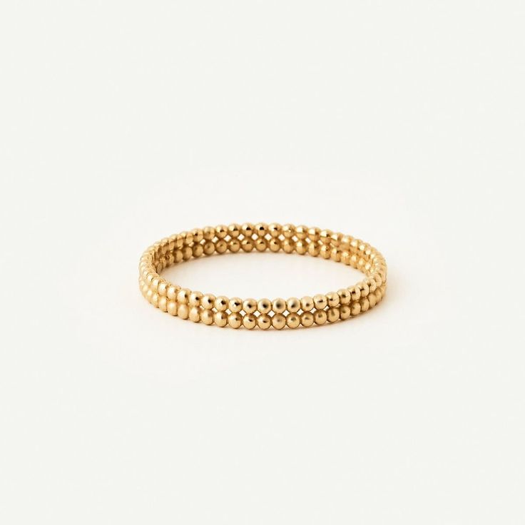 1- P R O D U C T ∙  D E S C R I P T I O N Delight in the timeless elegance of this 14K Solid Gold Double Ball Beaded Eternity Ring. Perfect for women who appreciate minimalist style, this dainty beaded stacking ring is a charming way to express your unique style. Made from authentic 14K gold, it's a thoughtful gift for a loved one or a special treat for yourself. 2- P R O D U C T ∙  D E T A I L S * Gold material: 14K solid gold * Choice of gold color: Yellow gold, Rose gold, White gold * Choice of ring size: - 5 US/CA - 5 1/4 US/CA - 5 1/2 US/CA - 5 3/4 US/CA - 6 US/CA - 6 1/4 US/CA - 6 1/2 US/CA - 6 3/4 US/CA - 7 US/CA - 7 1/4 US/CA - 7 1/2 US/CA - 7 3/4 US/CA - 8 US/CA - 8 1/4 US/CA - 8 1/2 US/CA - 8 3/4 US/CA - 9 US/CA * Dimensions: Band thickness: 2.60 mm / 0.10 in 3- S H I P P I N G ∙ Fine Jewelry Yellow Gold Rings With Jubilee Bracelet, Elegant 14k Gold Rings With Round Beads, Yellow Gold Stacking Rings, Beaded Stacking Rings, Double Band Ring, Double Band Rings, Beaded Ring, Solid Gold Band, Ringe Gold