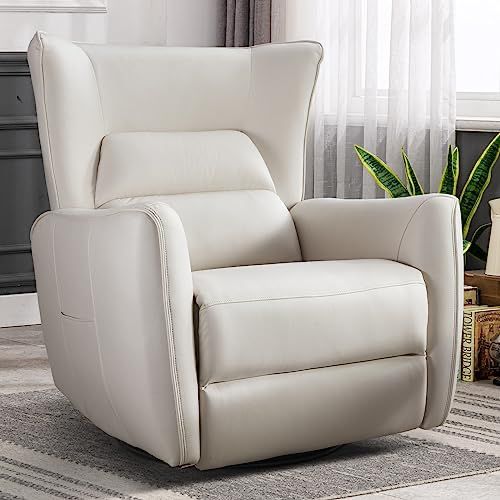 a white recliner chair sitting on top of a rug