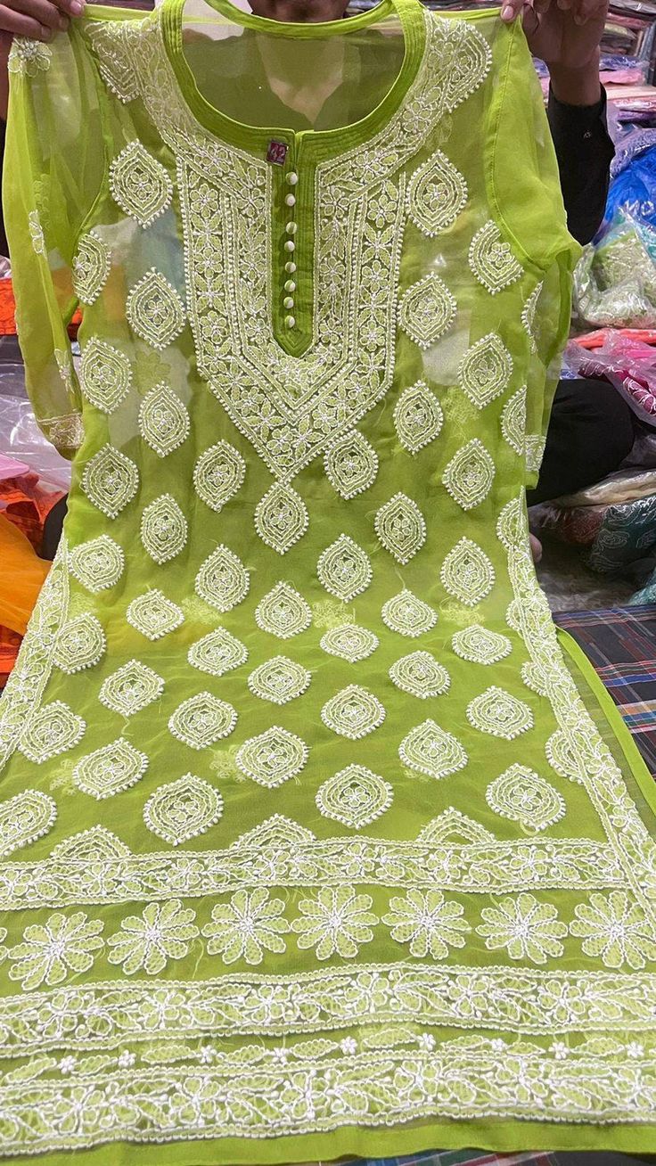 Attractive Chikankari Lucknow georgette kurta which gives a elegant look for a party which comes with free cotton inner with 3/4th sleeves Length 46 inches Summer Anarkali Georgette Kurta, Cotton Chikankari Embroidery Kurta For Party, Cotton Kurta With Chikankari Embroidery For Party, Green Chikankari Embroidery Lawn Suit For Party, Summer Traditional Wear With Dabka Work In Georgette, Summer Festive Kurta With 3/4 Sleeves, Green Georgette Salwar Kameez For Summer, Bollywood Style Georgette Kurta For Summer, Green Georgette Lawn Suit For Summer